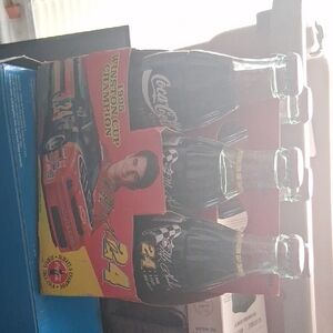Coca-Cola Racing Champion Bottles with Red and Black Design